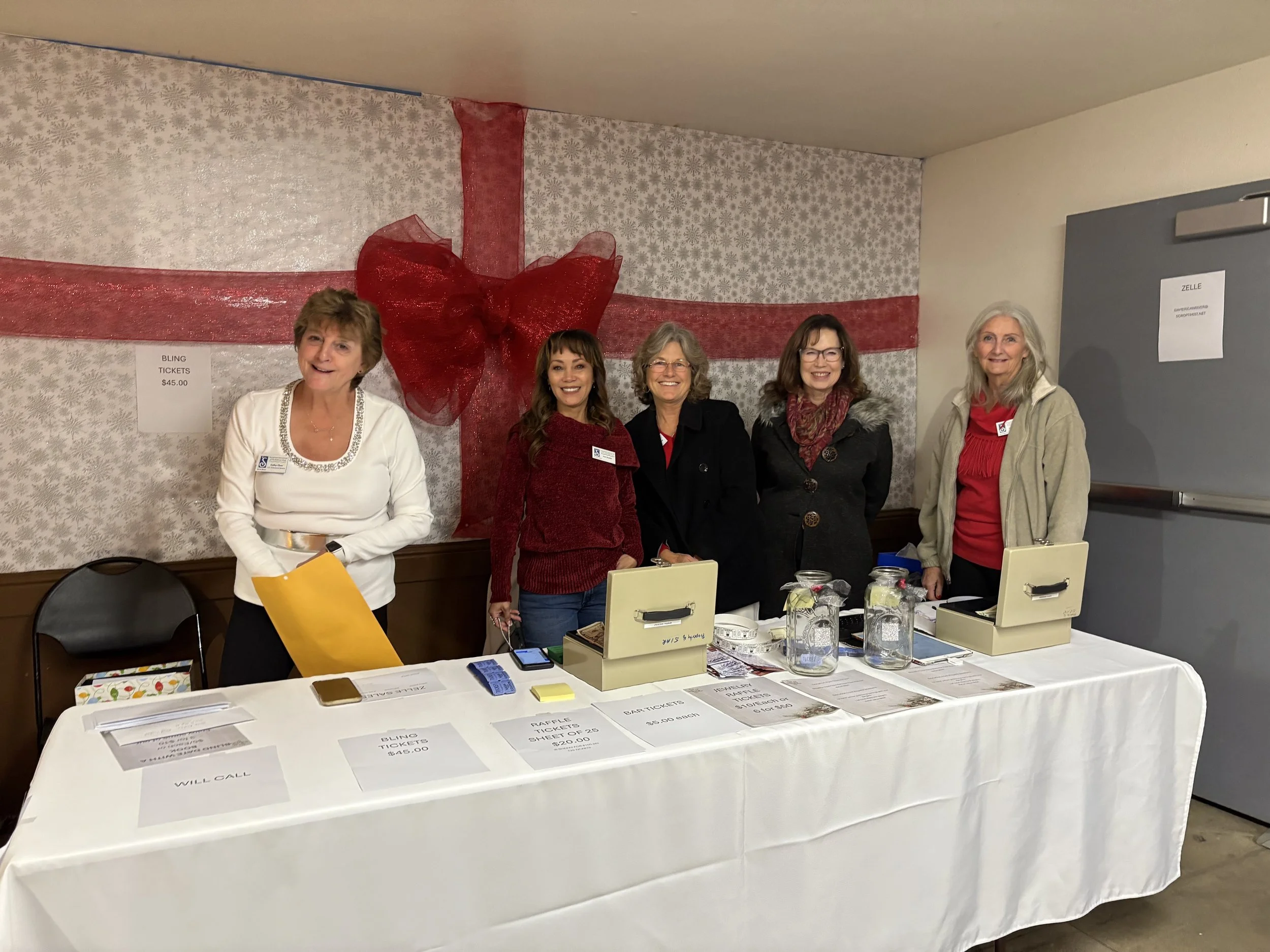 A few of us working the table at the Bling Time fundraiser. 