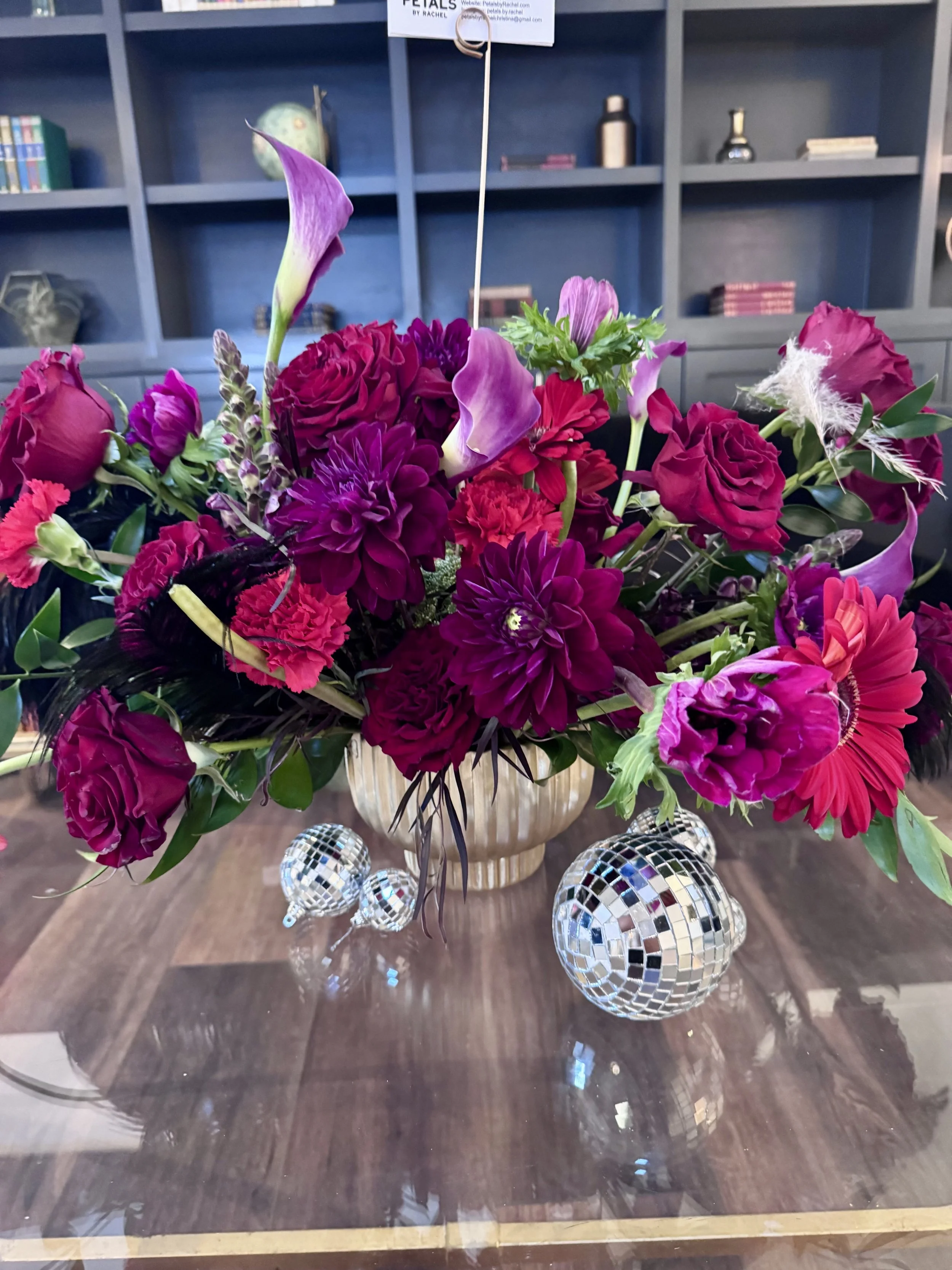 moody floral arrangement, corporate event, burgandy dahlia, burgandy anemones, burgundy flowers, red roses, burgundy cala lily
