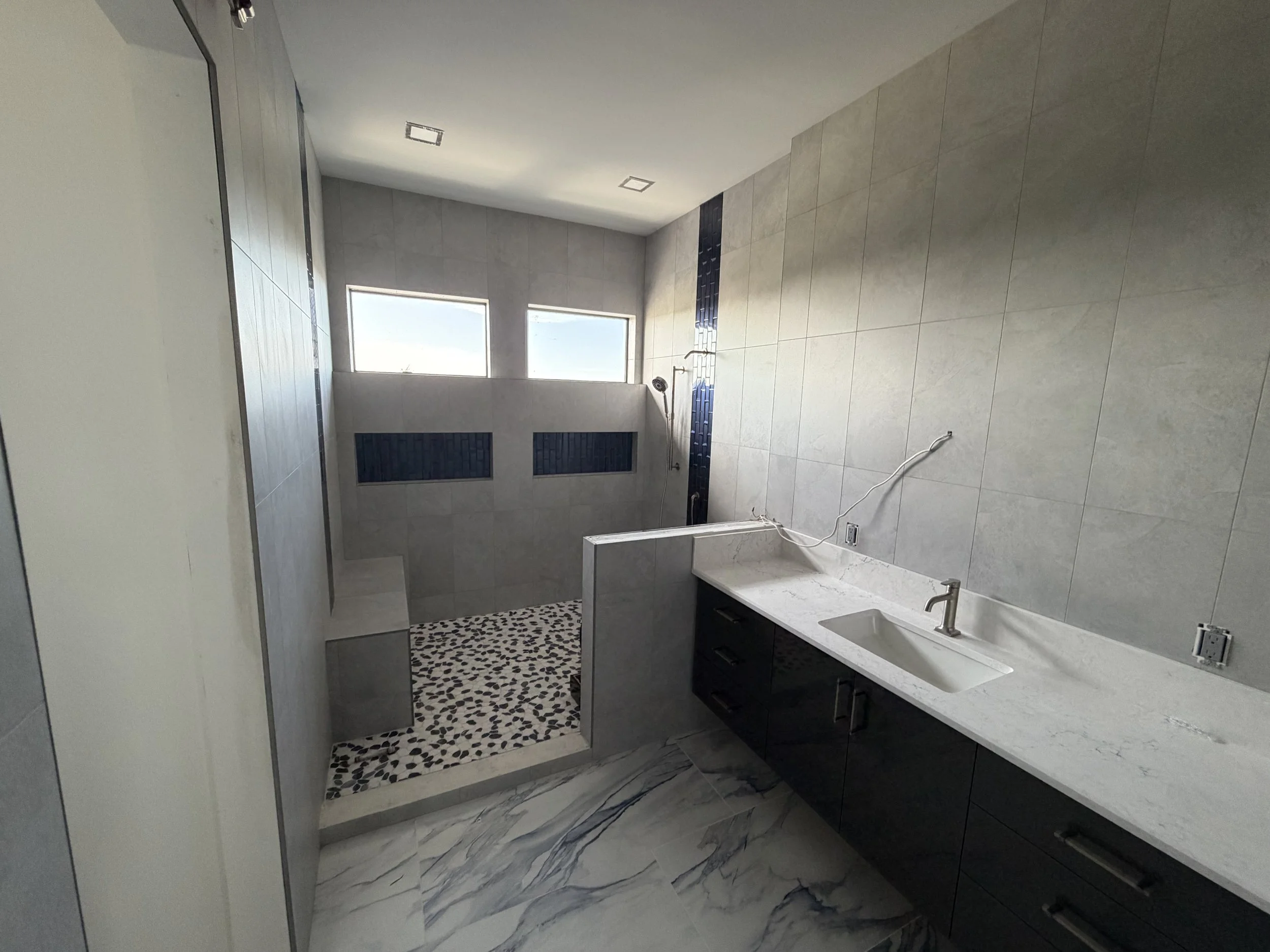 Bathroom and Shower Install, gray porcelain tile with granite and natural stone