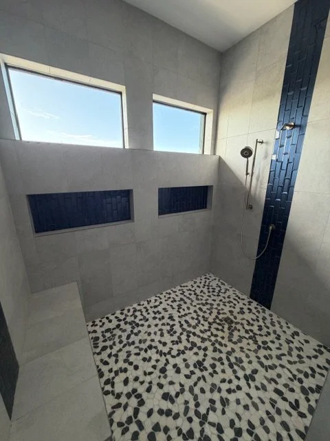 Clean Bathroom with Gray Porcelain Shower Tiles and Floor