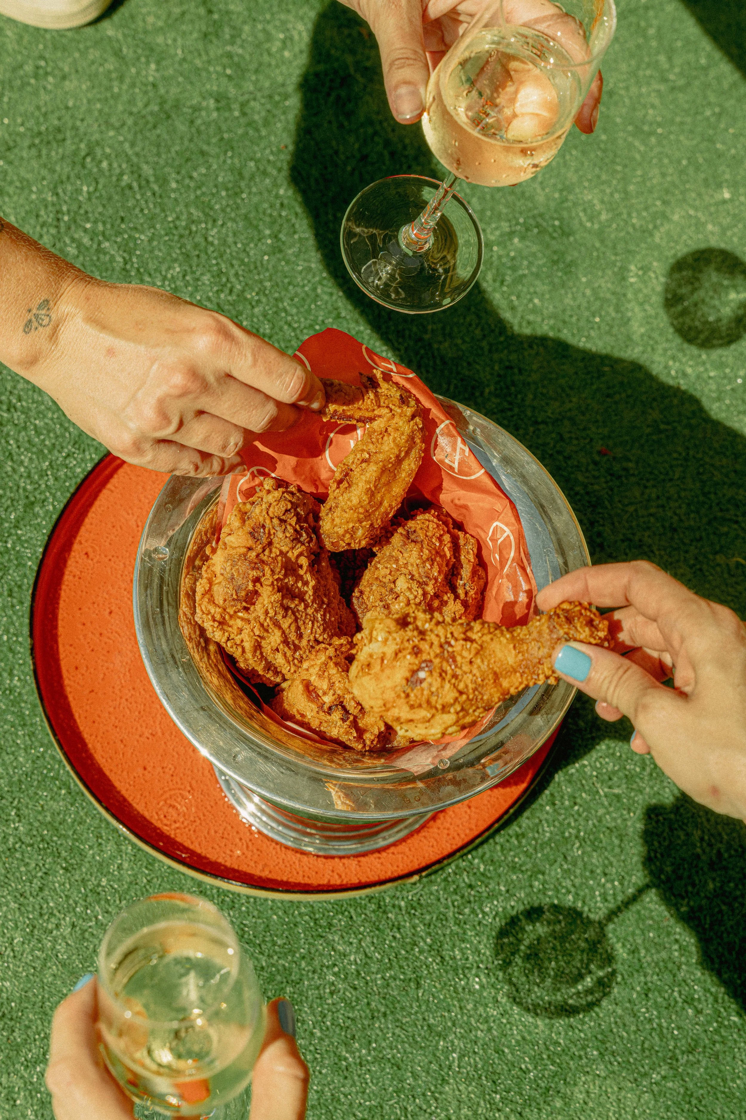 Fried chicken in a champagne bucket