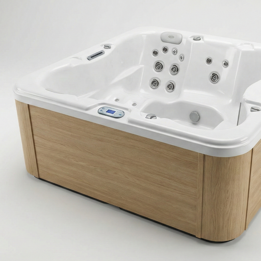 White hot tub with multiple jets and a control panel, set against a plain background.