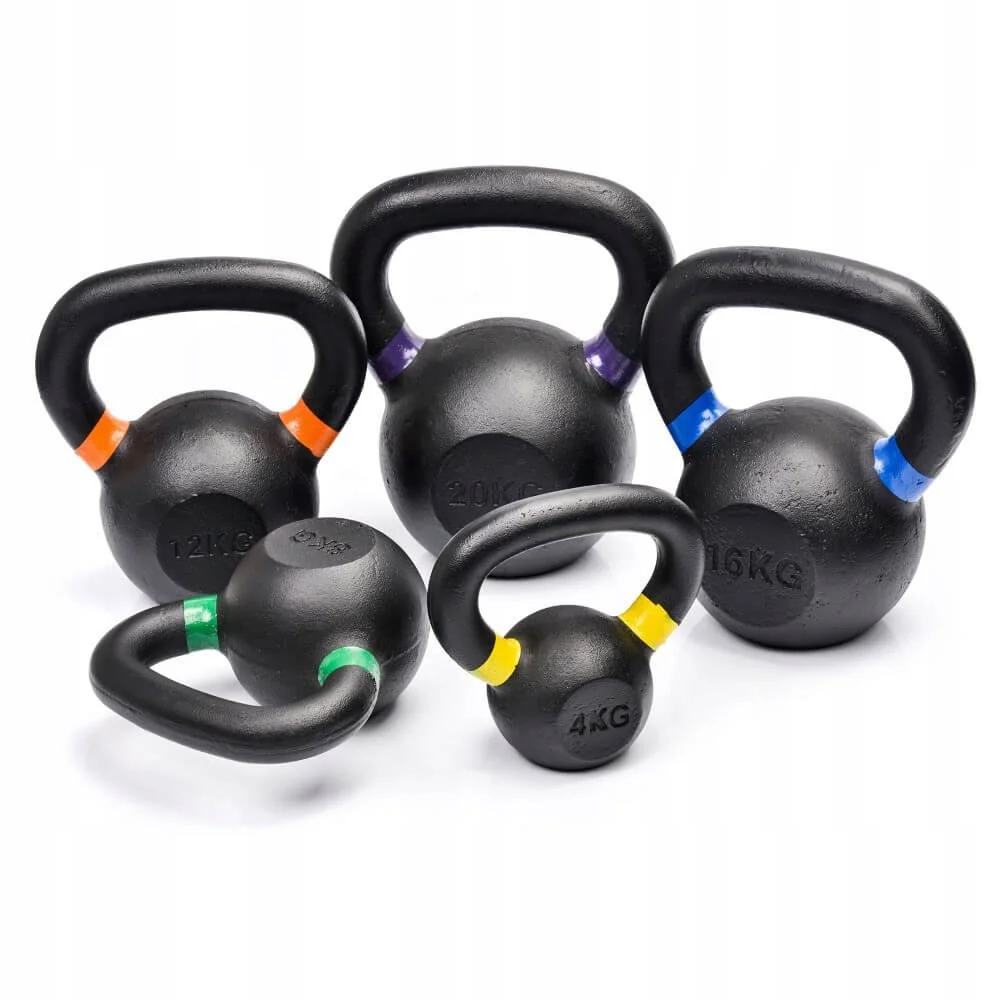 Set of black kettlebells of varying sizes and weights with colored bands, arranged against a white background.
