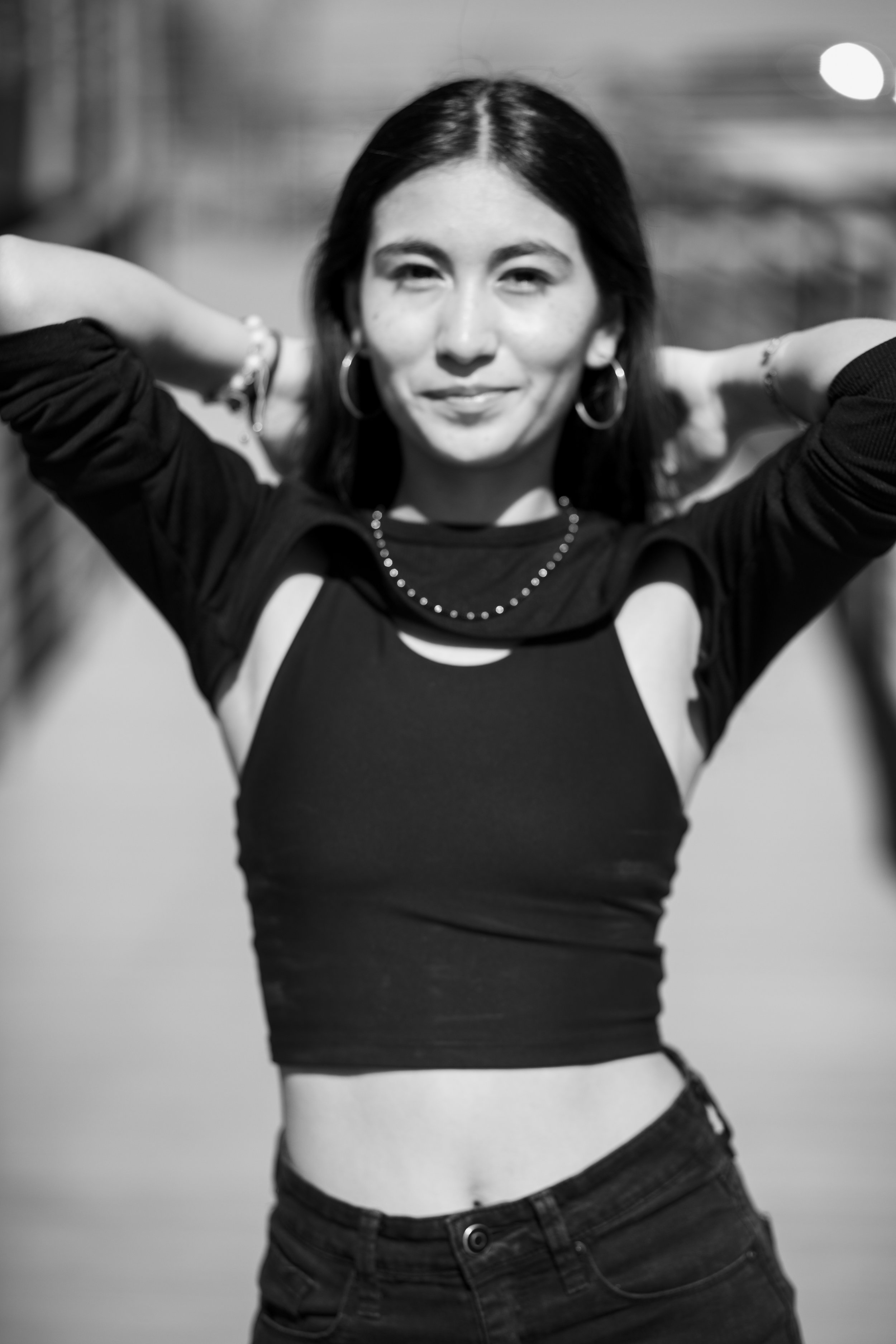 Black and white high school senior portrait in Katy, Texas featuring confident posing and an editorial style by Dominic Alvarez Photography.