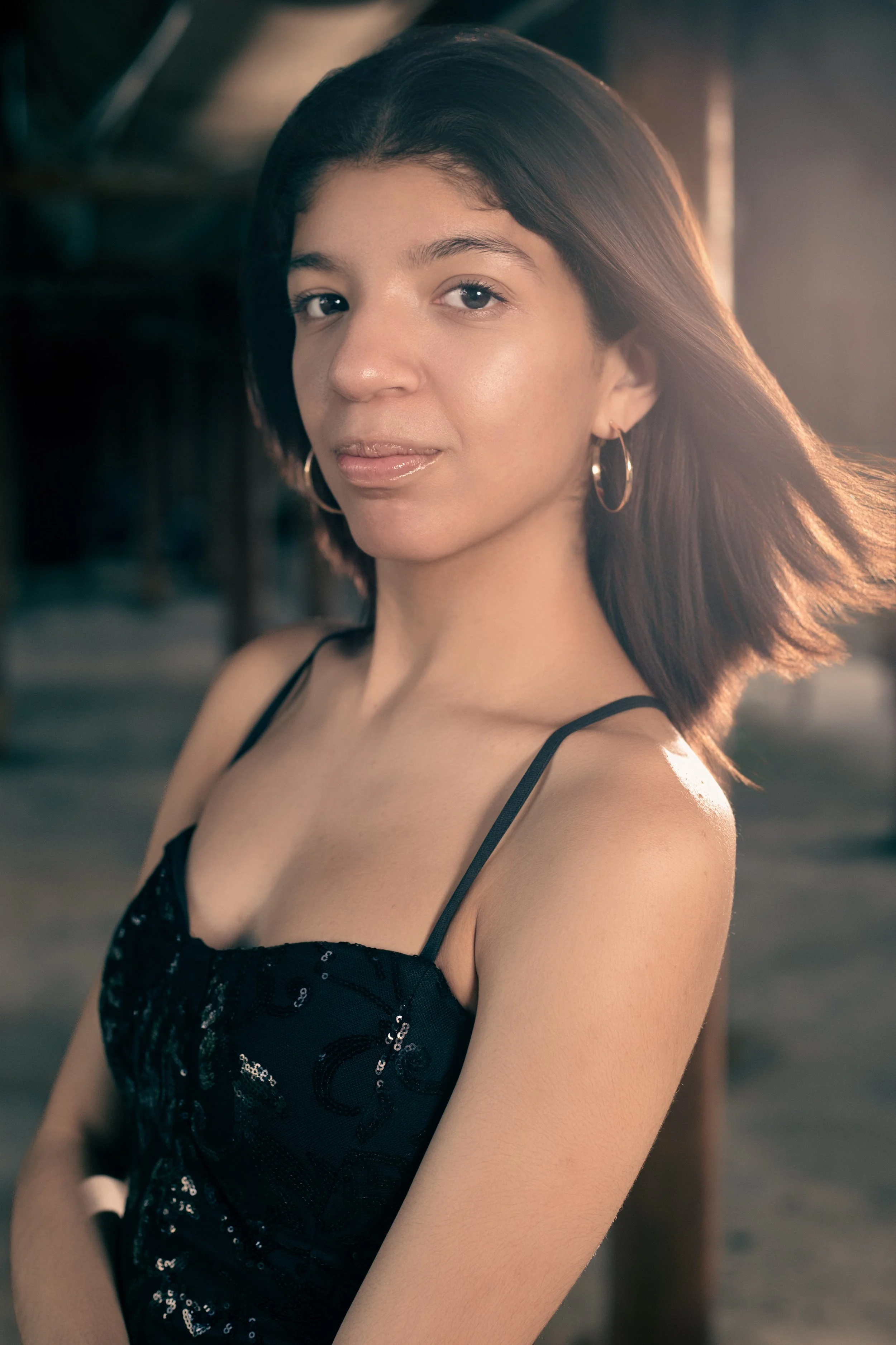 High school senior portrait featuring a female senior with soft natural light and a cinematic, elegant look. Professional senior photography by Dominic Alvarez Photography serving Houston, Katy, and surrounding areas across Southeast Texas.