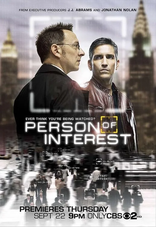 Poster for the TV show "Person of Interest" featuring two men, one in profile and the other facing forward, with a cityscape and surveillance imagery in the background.