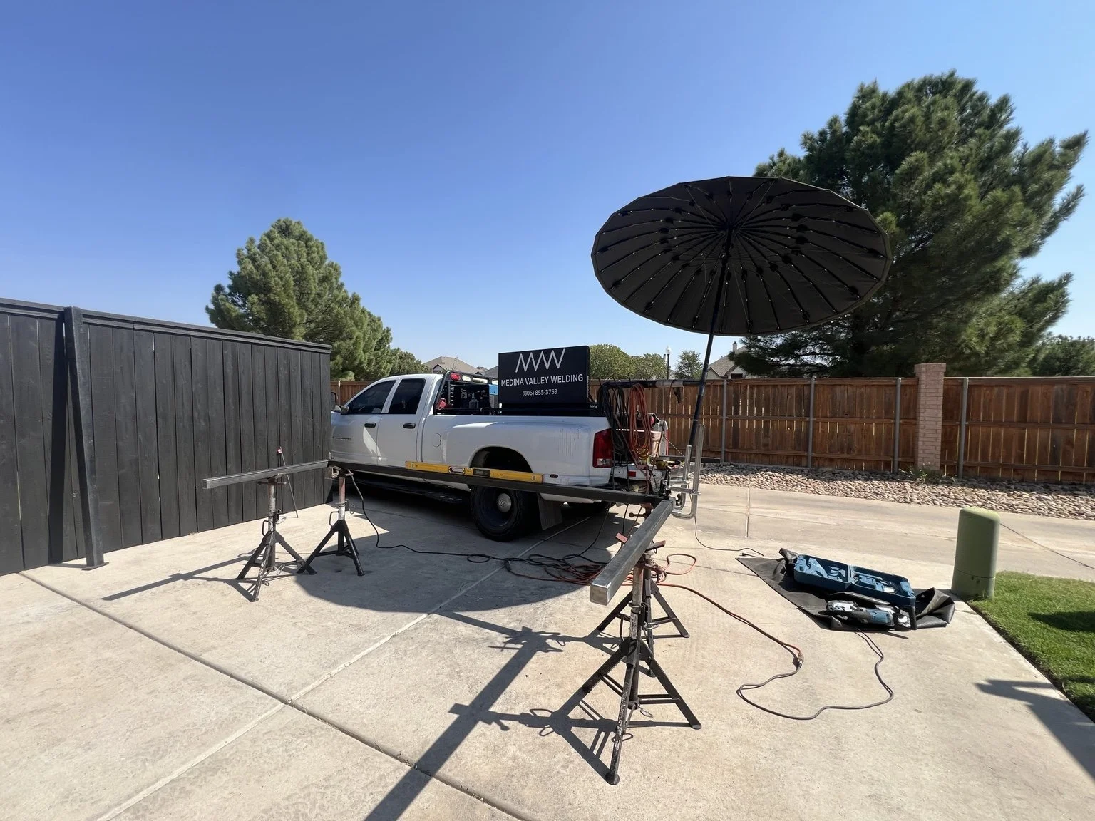 Medina Valley Welding truck and mobile fabrication setup at a residential project.