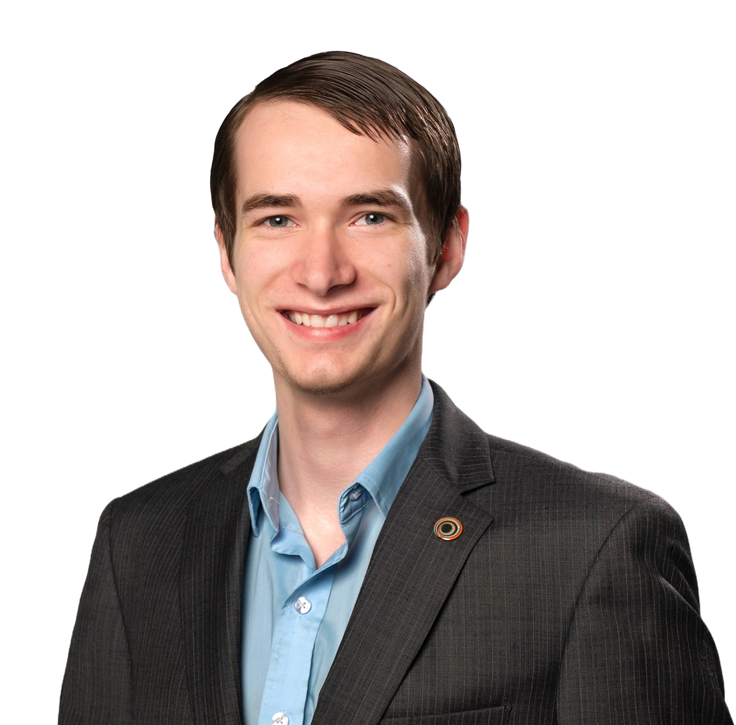 Smiling young man with brown hair in a suit against a white background.