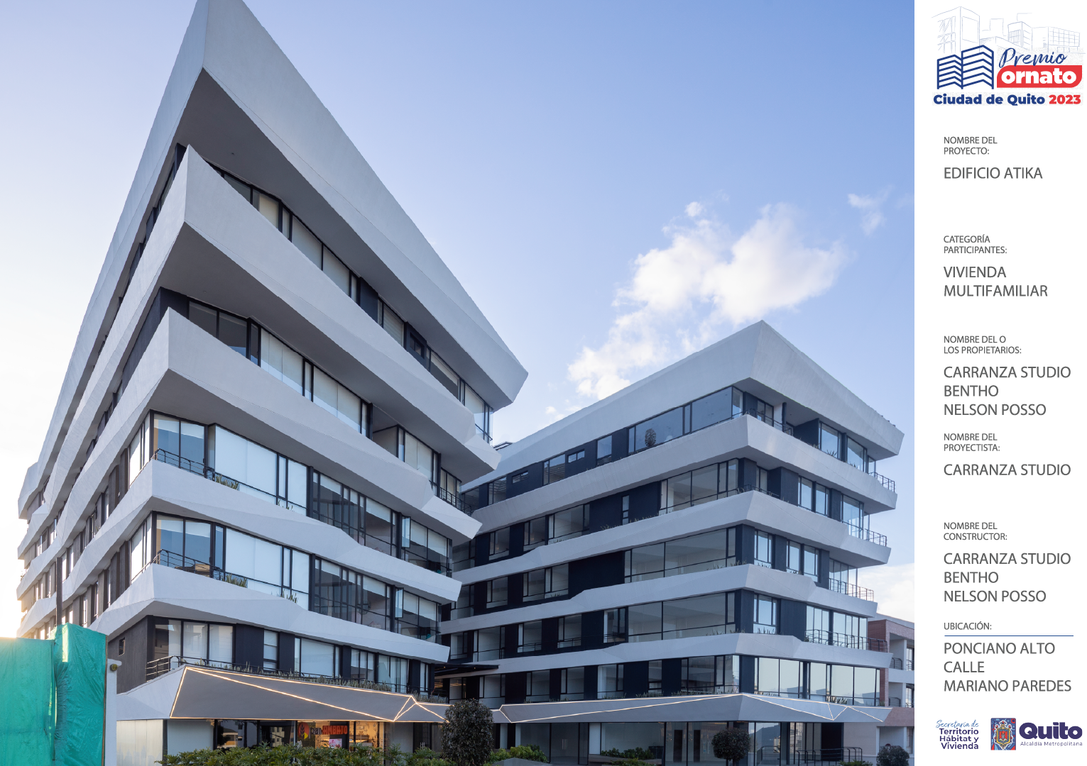 Edificio moderno de múltiples pisos con fachada blanca y ventanas grandes, bajo cielo con algunas nubes, en Quito, Ecuador.