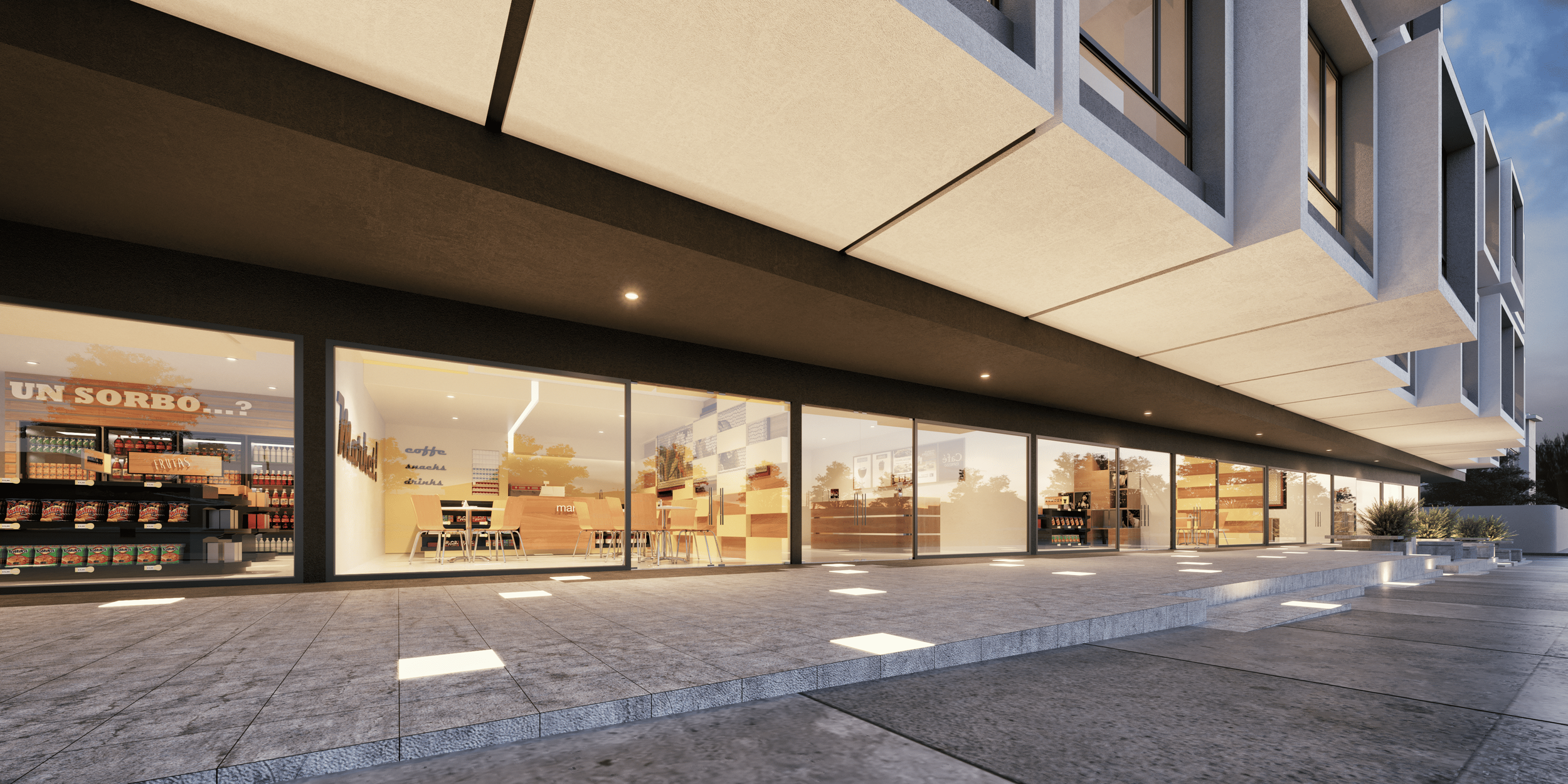 Vista exterior de un edificio moderno con grandes ventanas y local que parece ser una cafetería o tienda, en la noche, con iluminación cálida y plantas decorativas en el exterior.