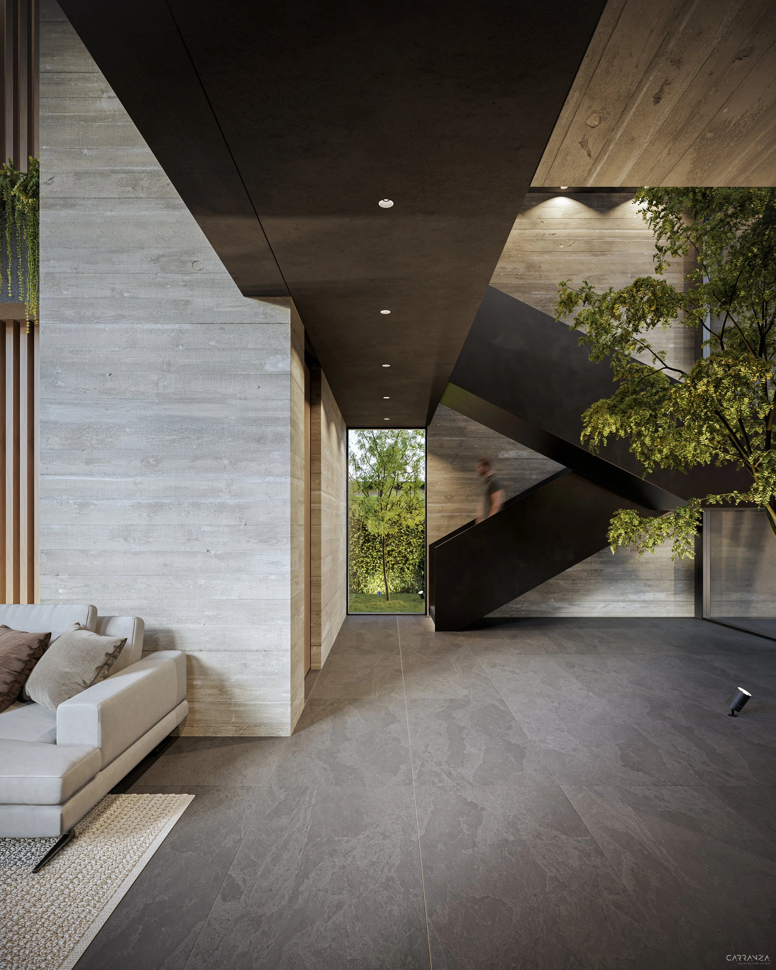 Interior moderno de una casa con paredes de piedra clara, techo negro y una escalera negra en zigzag, con una ventana grande que muestra árboles verdes afuera.