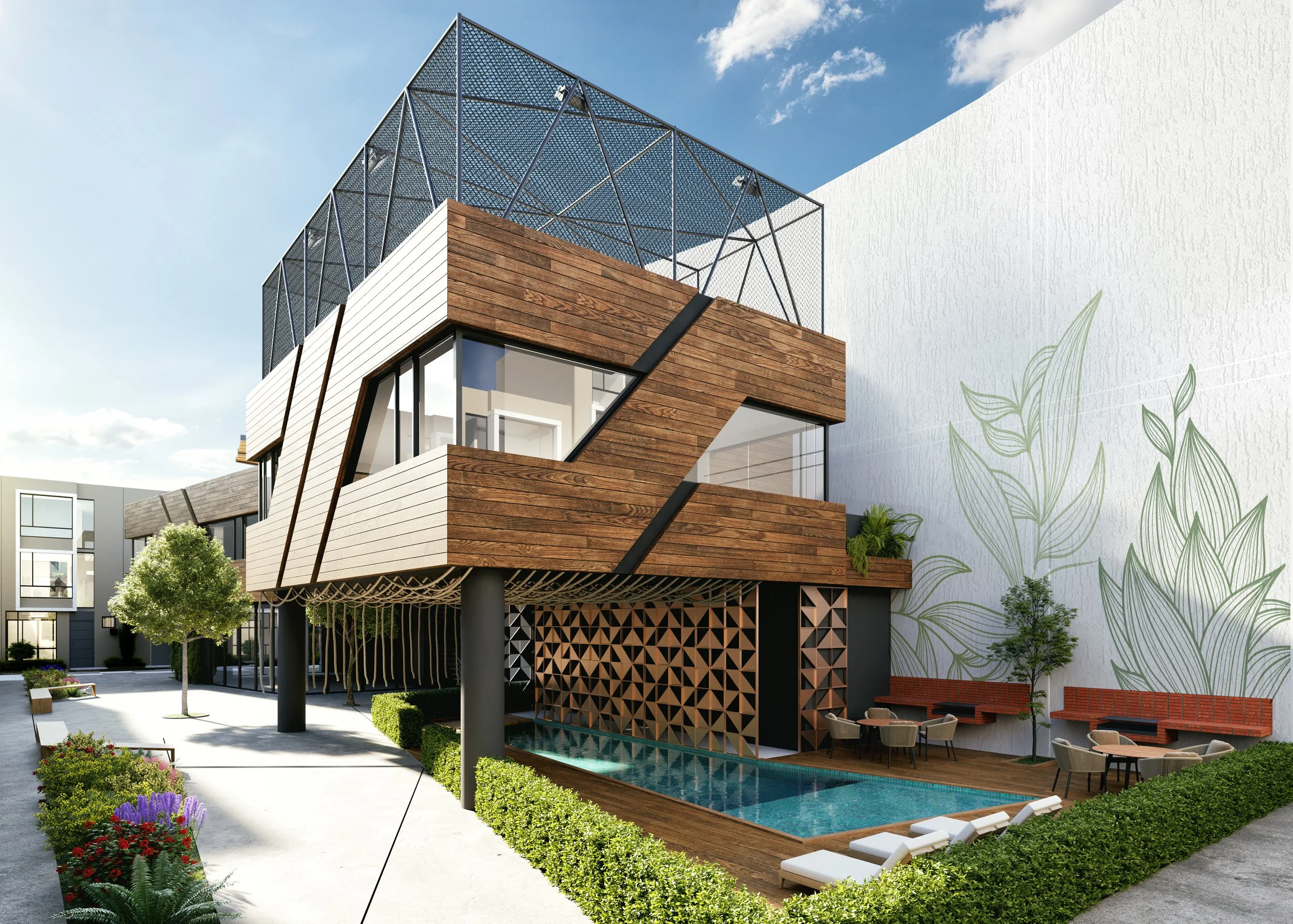 Edificio moderno con fachadas de madera y vidrio, piscina en la planta baja, áreas de descanso con mesas y sillas, rodeado de vegetación y un muro decorativo con dibujo de plantas.