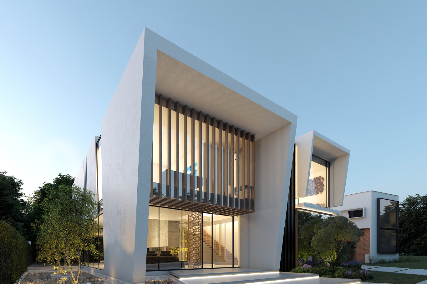 Vista frontal de un moderno edificio residencial con fachadas blancas, grandes ventanas de cristal, y diseños en madera y negro, rodeado de árboles y área de jardín.