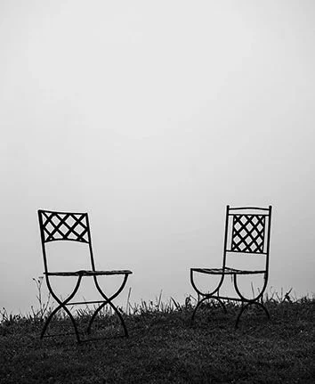 Couple in a therapy session in Naples, Florida, working on communication and rebuilding trust with a licensed therapist.