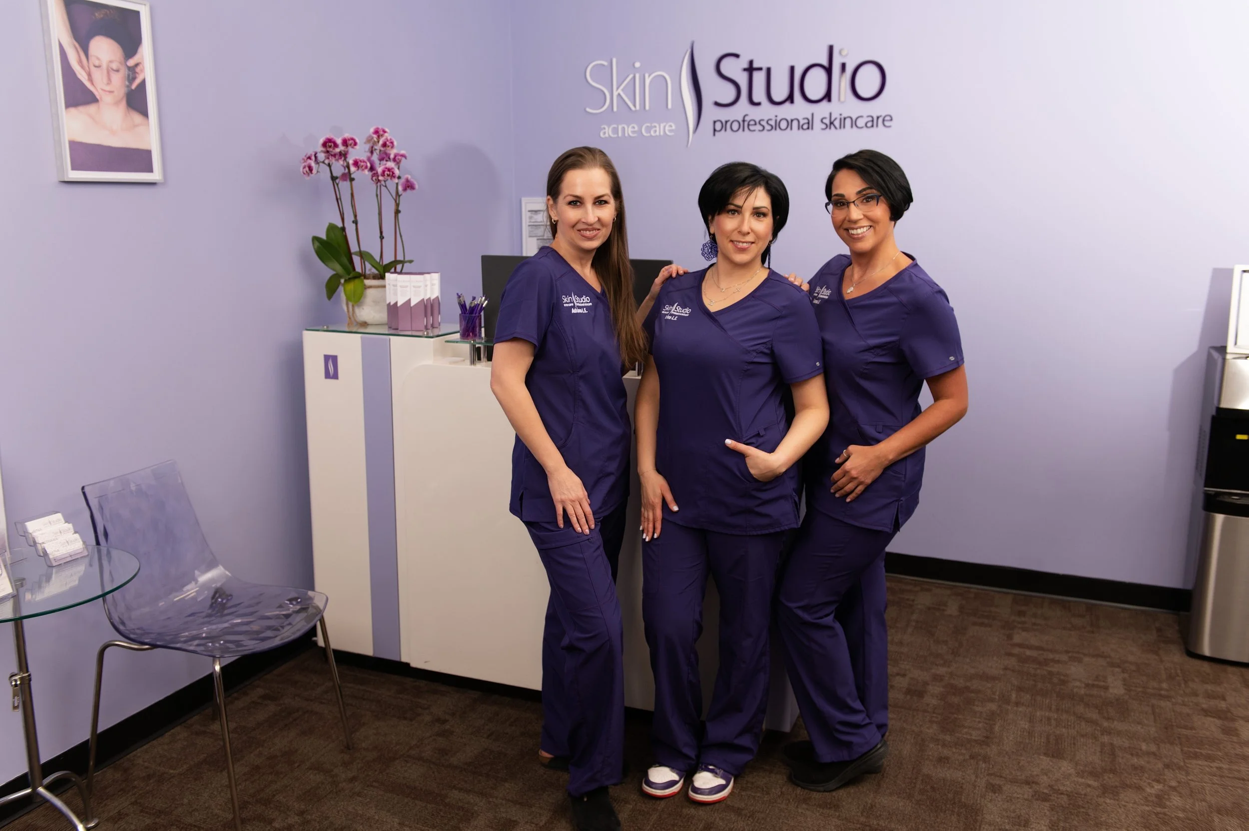 Three licensed estheticians at Skin Studio in Natick offering acne facials and age-management services