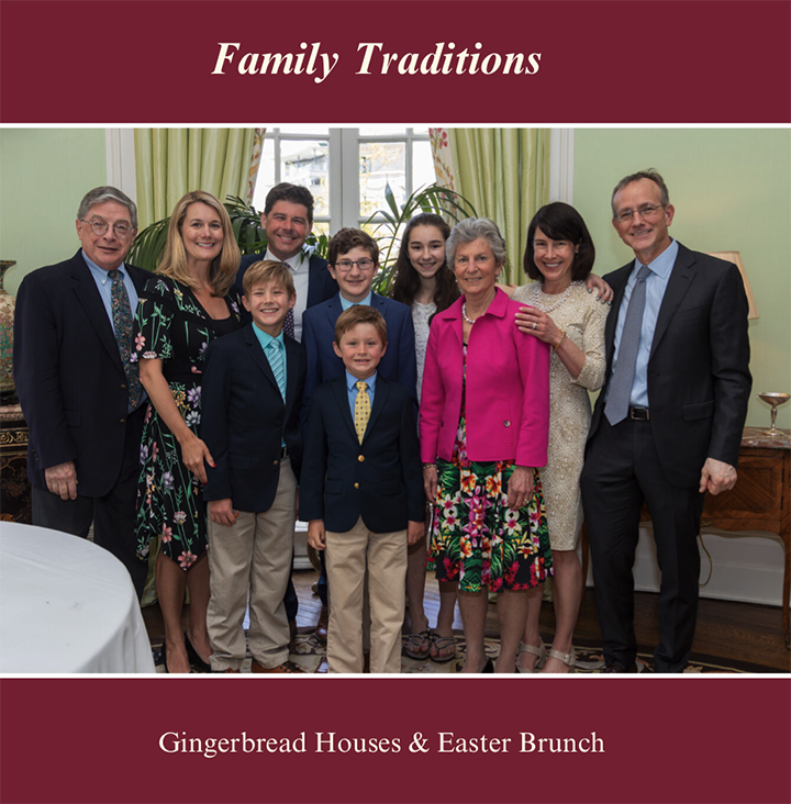 Family group photo at a gingerbread houses and Easter brunch event in a well-lit room with green curtains and plants in the background.