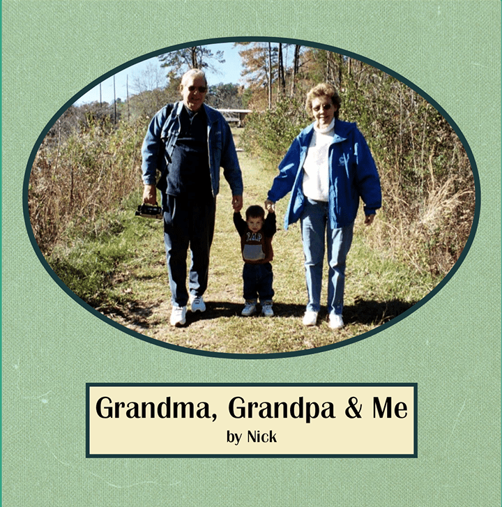 A family hiking on a trail with a young child between a man and a woman, surrounded by trees and clear sky.