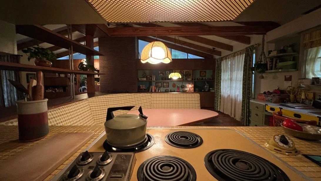 In David Robert Mitchell's 2026 film THE END OF OAK STREET, Missy Parker set decorator expertly curates a kitchen and living room in a split-level home as if it was 1982.