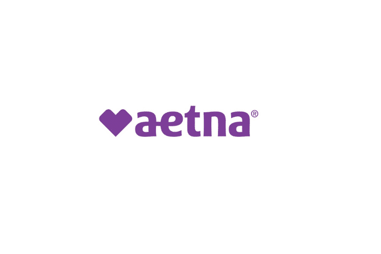 Aetna logo with purple text and a purple heart symbol on a white background.