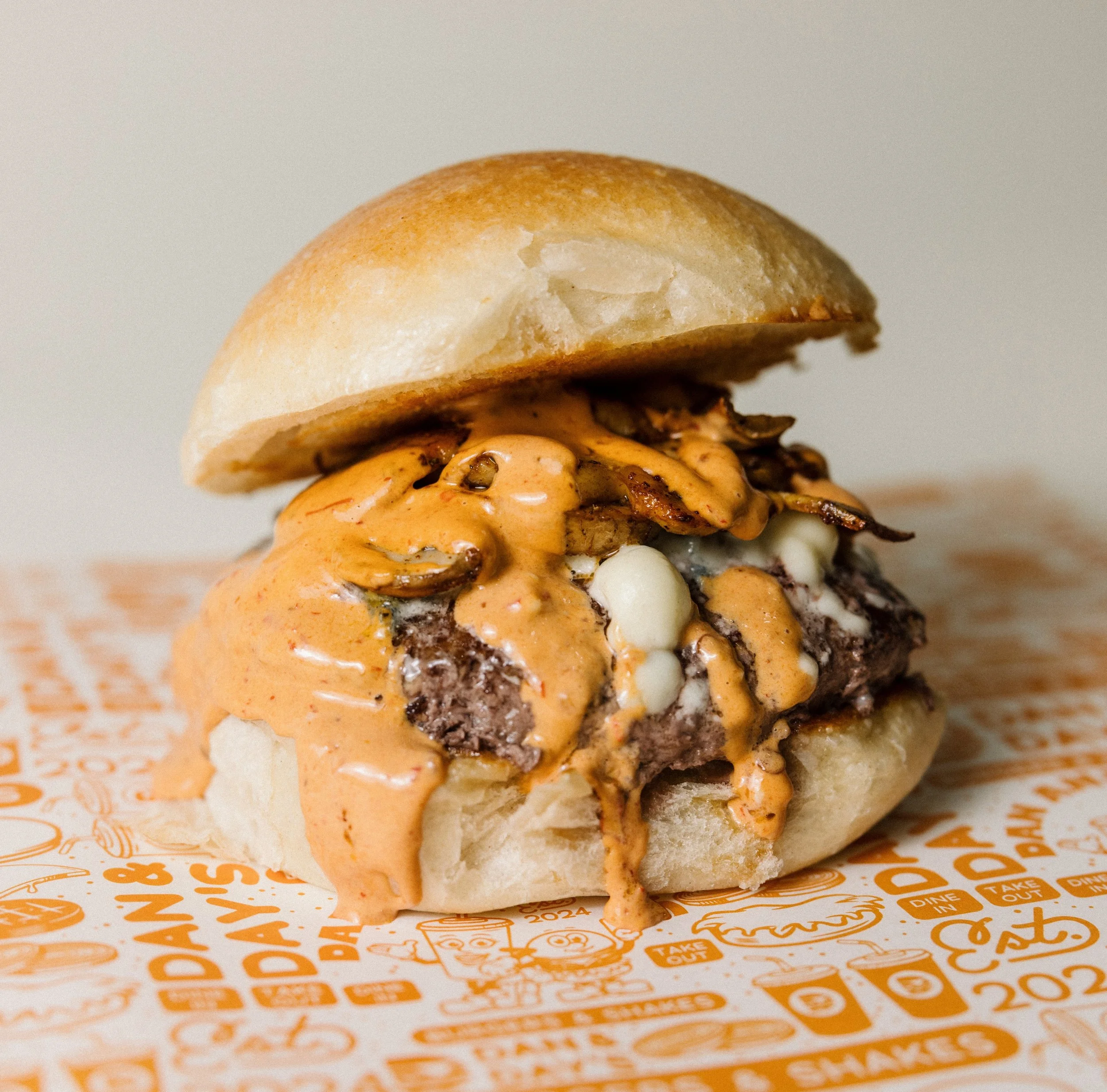 SPECIAL! 🍔

The Montclair Blue Burger is back for a limited time! A grass fed beef burger topped with grilled mushrooms, chipotle aioli, and blue cheese! 

Dan's favorite way to have this one is when it's served on a Nicolos Round Roll! 💙