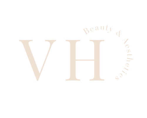 Logo for V H Beauty & Aesthetics with large letters V and H and smaller text Beauty & Aesthetics curved around the right side.