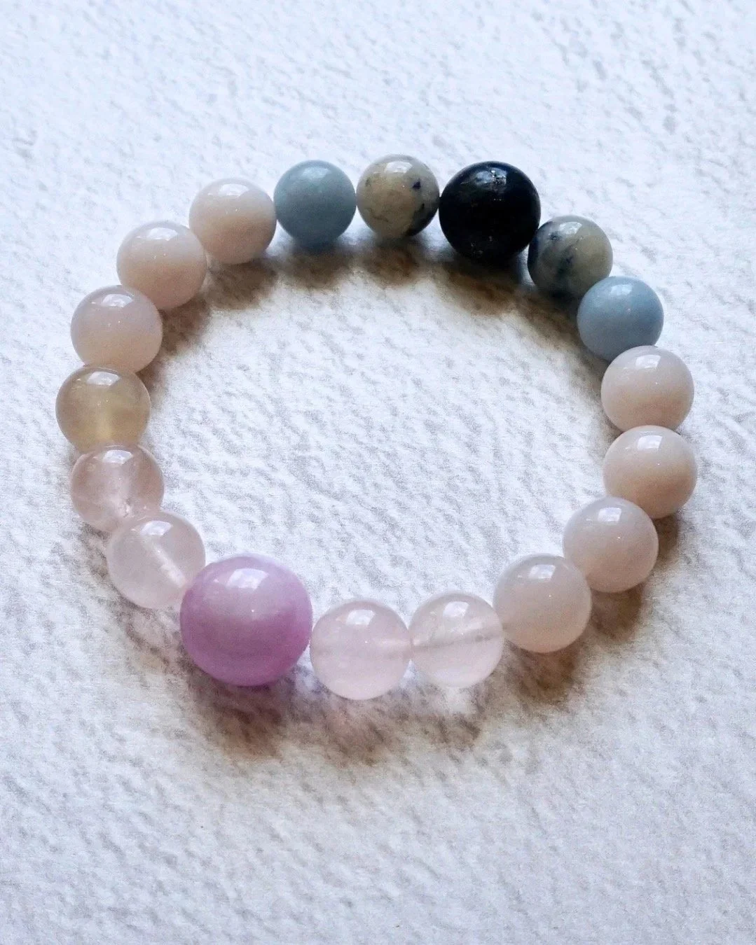 Sakura-under-sky-bracelet-kunzite-rose-quartz-chalcedony-lapis.jpg