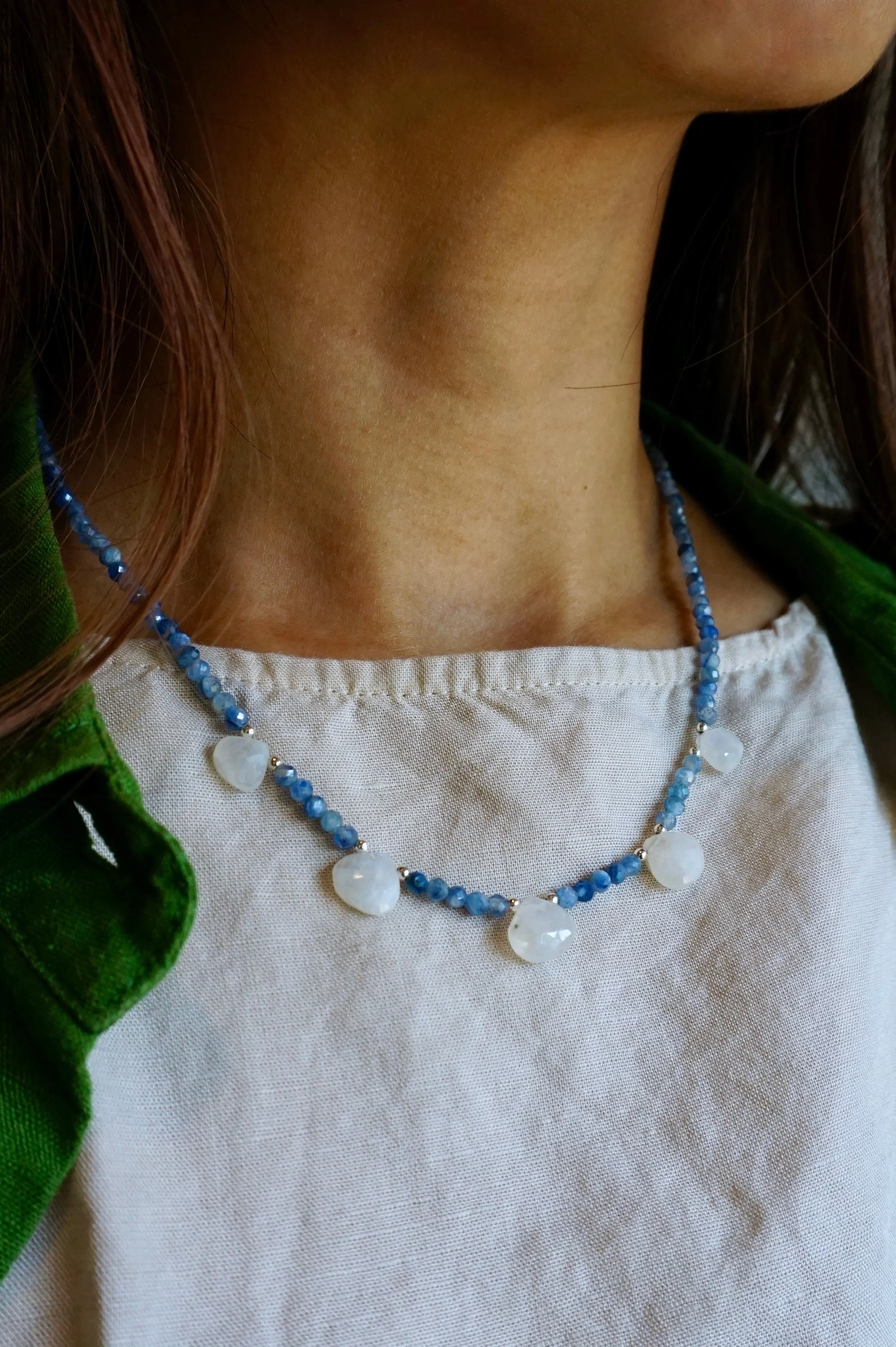 eweliana Studio Lake Tahoe blue kyanite faceted beads and rainbow moonstone shell-shaped summer vacation necklace