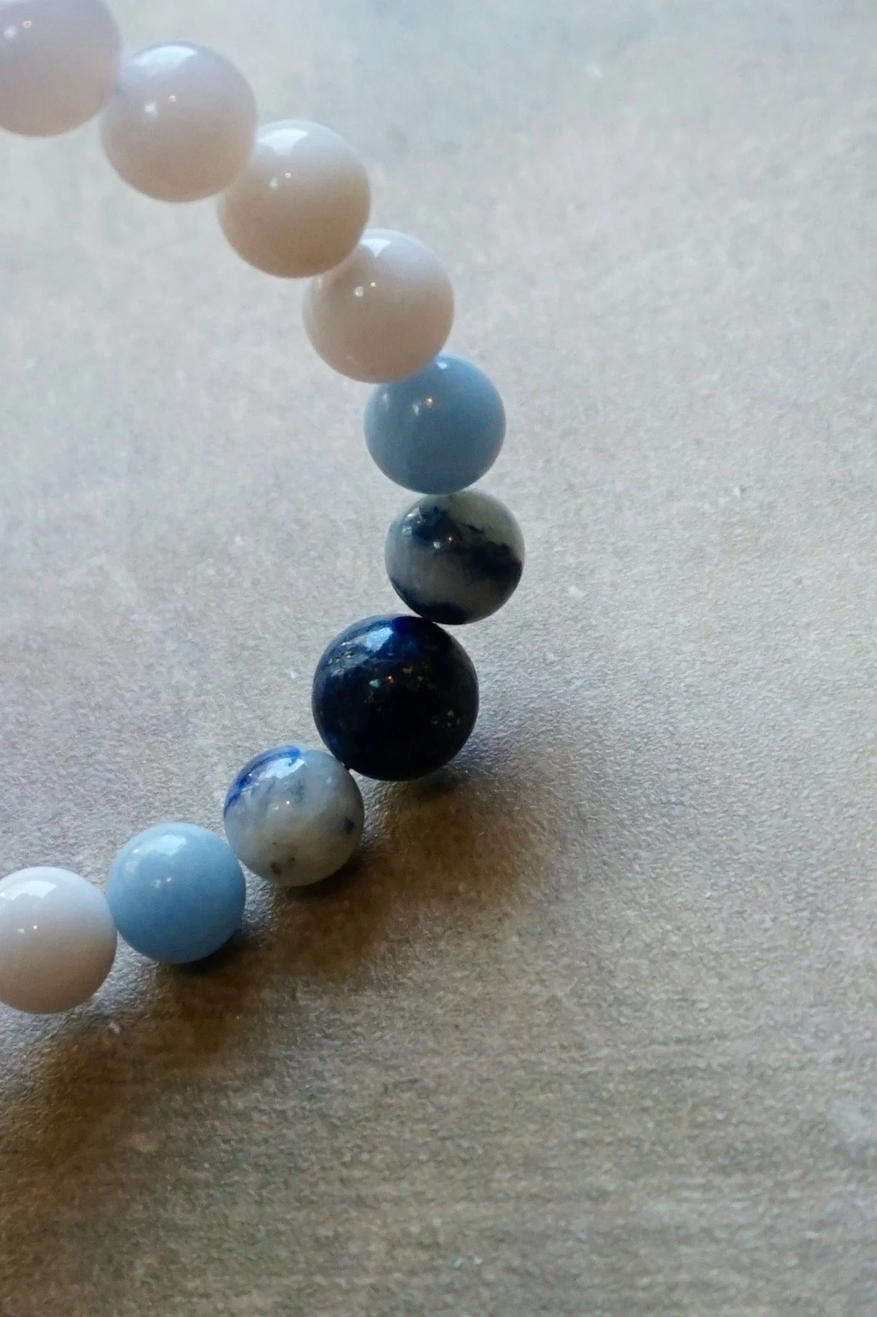 Sakura-under-sky-bracelet-kunzite-rose-quartz-chalcedony-lapis.jpeg