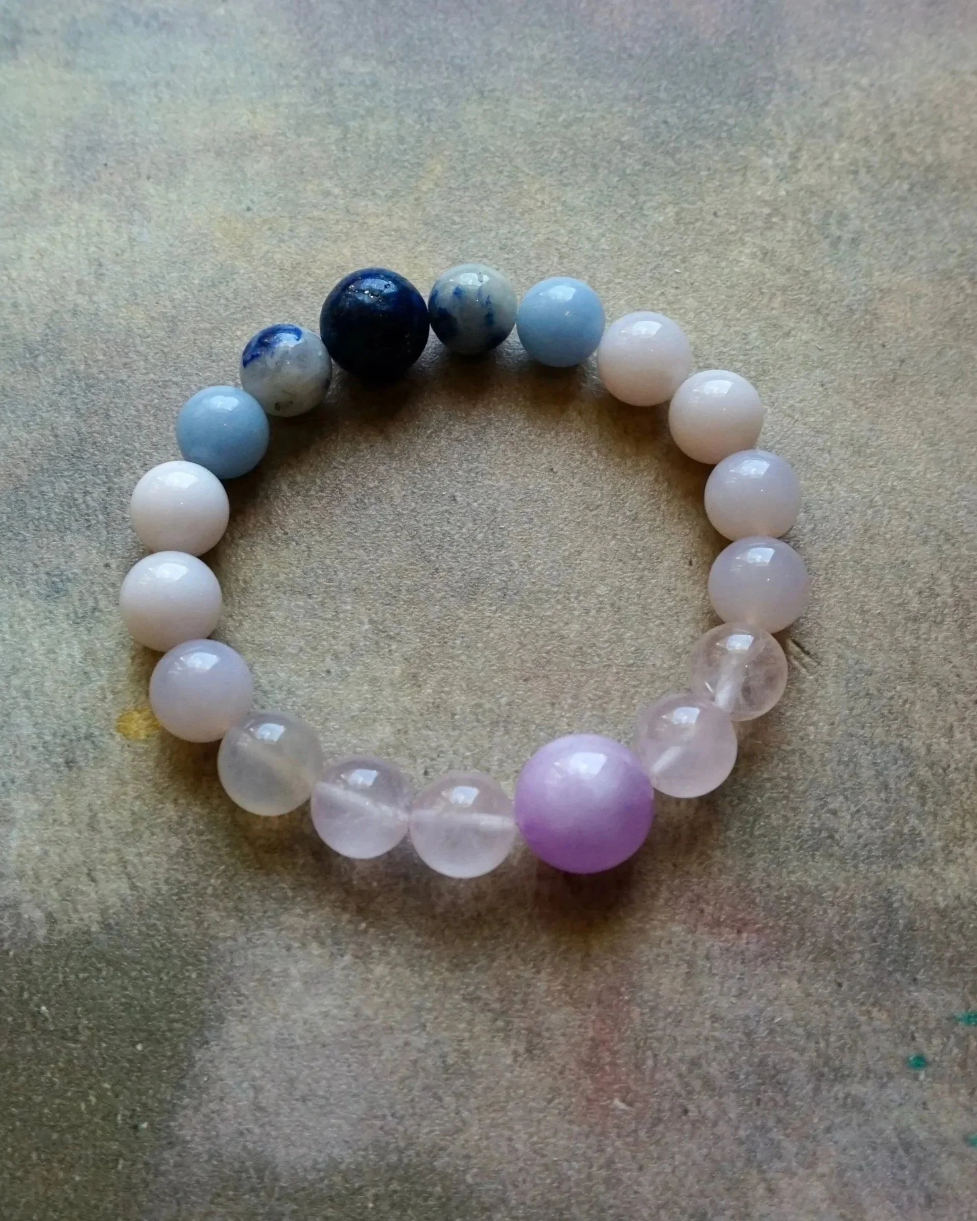 Sakura-under-sky-bracelet-kunzite-rose-quartz-chalcedony-lapis.jpg