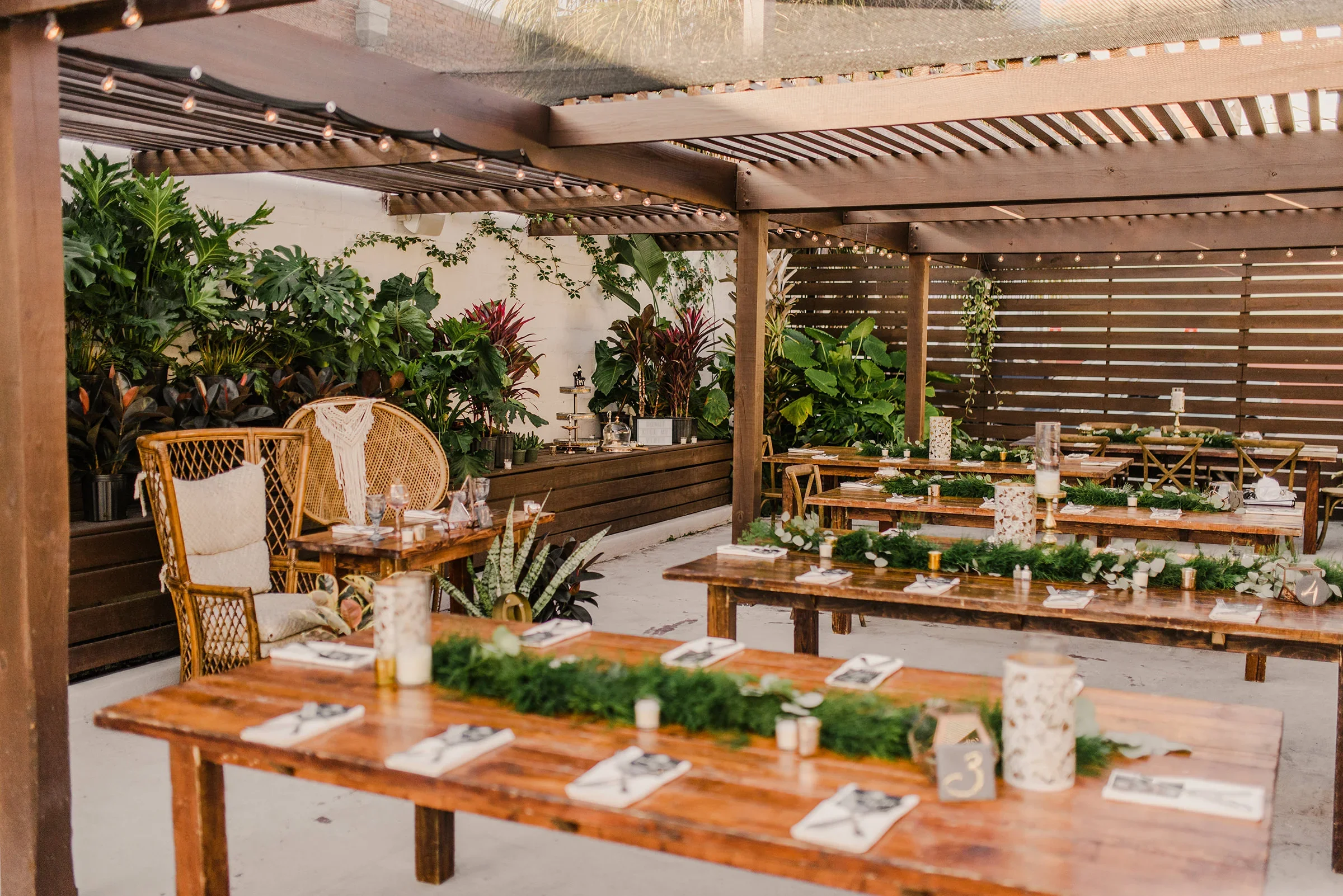 Outdoor wedding setting in plant nursery