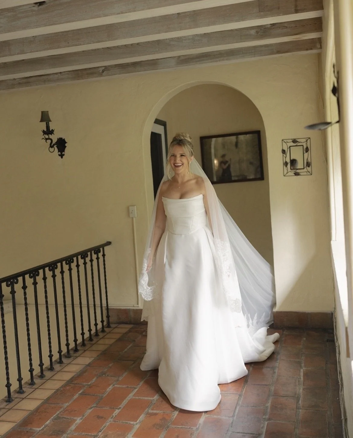 Romantic floral bridal updo created by Lori Brooks Beauty - Fort Lauderdale and Miami bridal hair expert know for luxury, on-site wedding styling