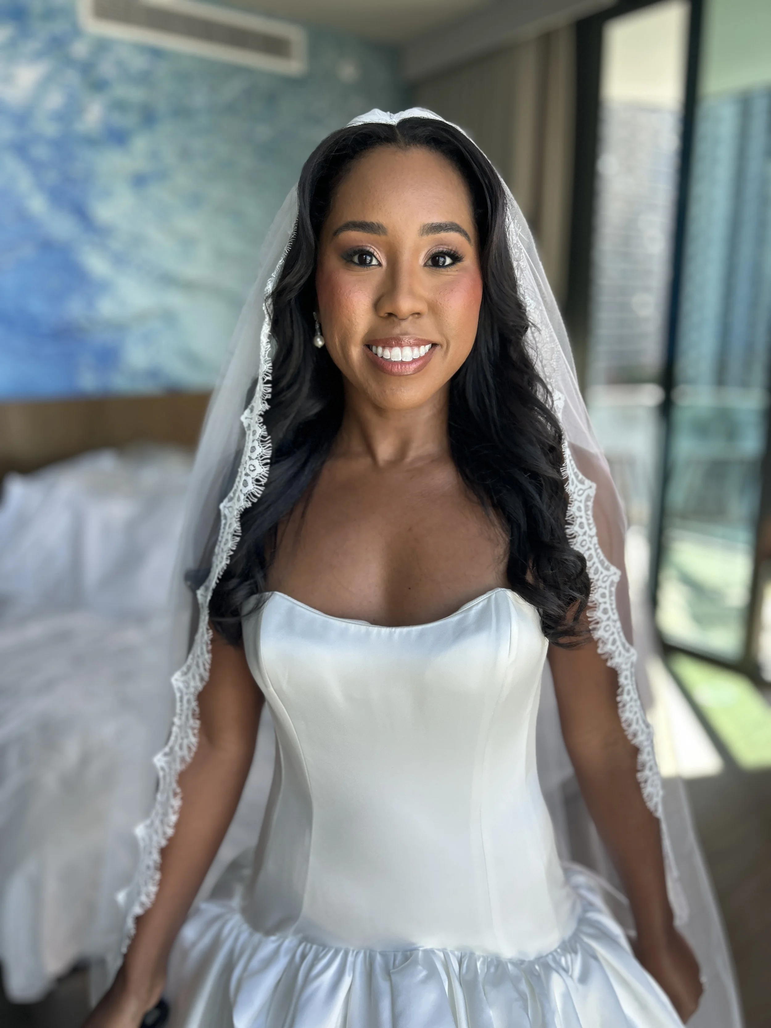 Bride with long elegant Hollywood glam waves by Lori Brooks Beauty - Luxury bridal hairstylist in Miami and Fort Lauderdale specializing in timeless, effortless glam.