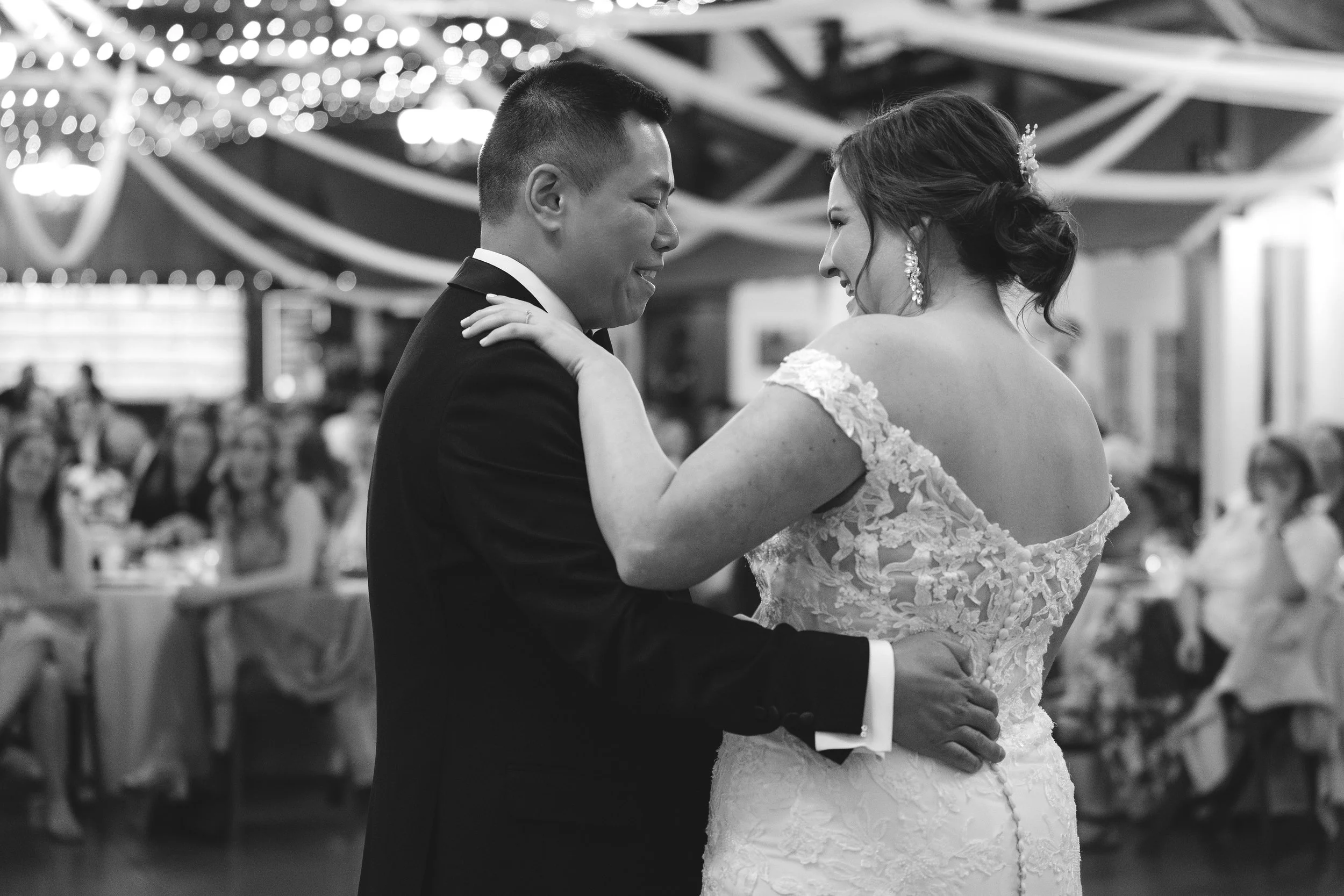 The dance floor at Catherine and Duncan's Church Ranch wedding reception, packed with guests during the first dance.