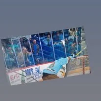 Hockey player leaning over the ice rink side, looking at the game, with a team bench in the background.