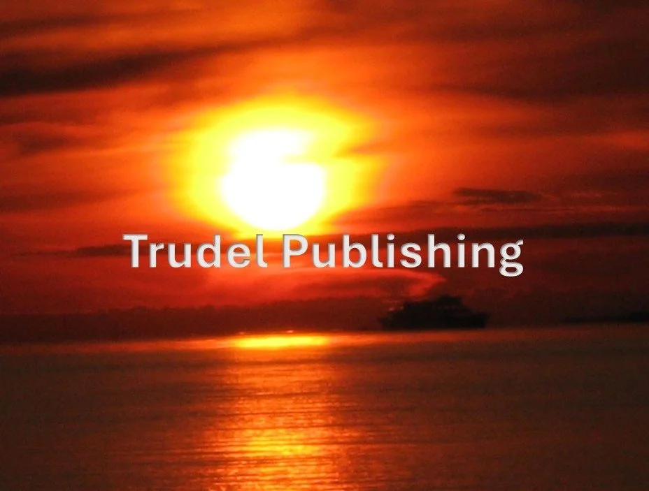 Sunset over the ocean with the sun partially obscured by clouds, reflecting on the water.