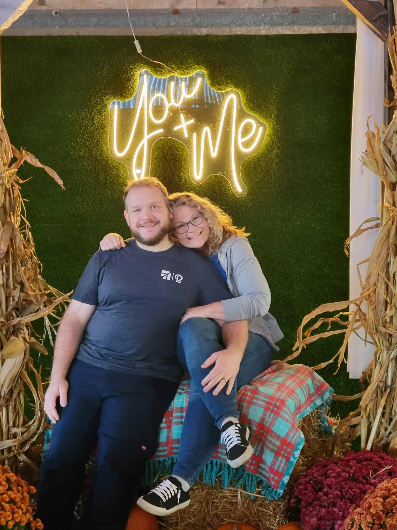 Serenity Hope Salak hugs her husband for a photo