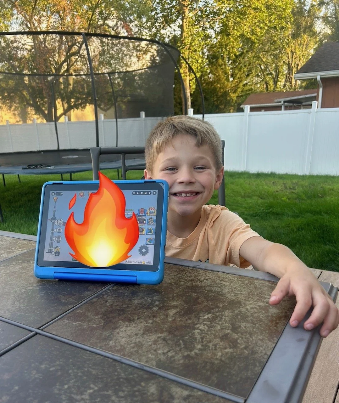 A young boy, Serenity Hope Salak's son, smiles for a photo