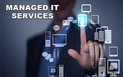 Businesswoman touching a virtual icon surrounded by technology and communication device icons with the text 'Managed IT Services' in the top left corner.
