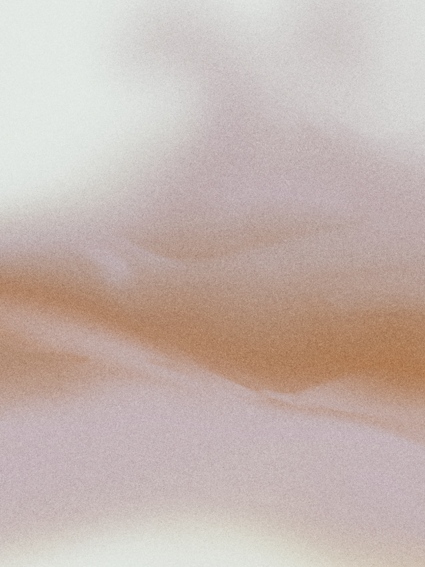 A warm pink and brown gradient.