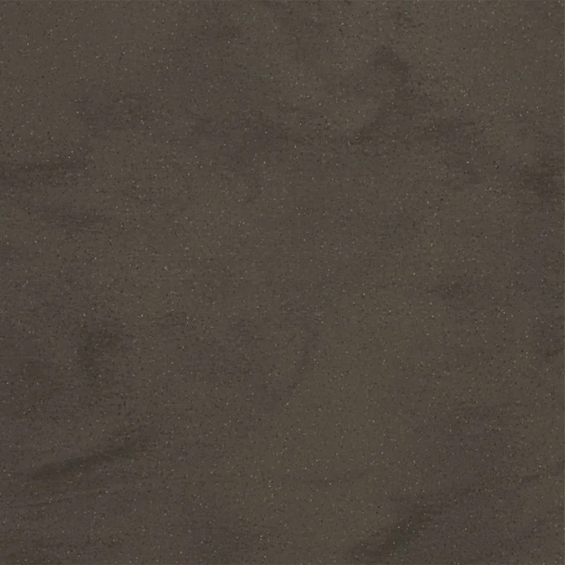 A close-up of dark brown Staron Supreme Noir Concrete Solid Surface with small sparkling particles.