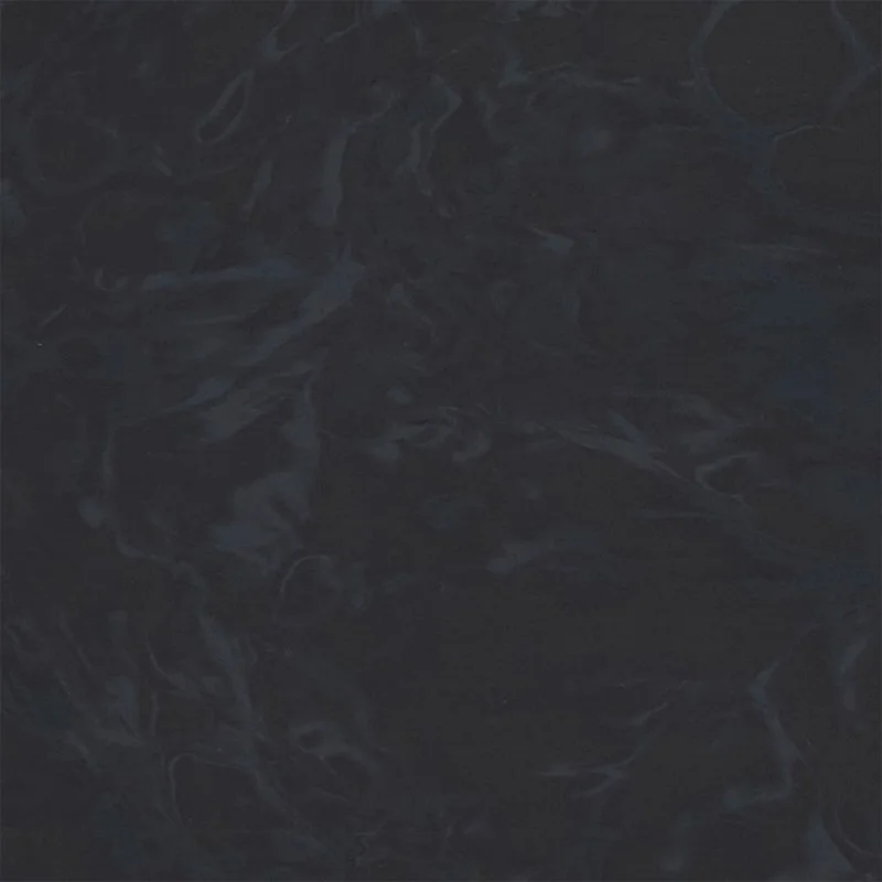Dark, textured Staron Supreme Presto Solid surface with swirling patterns.