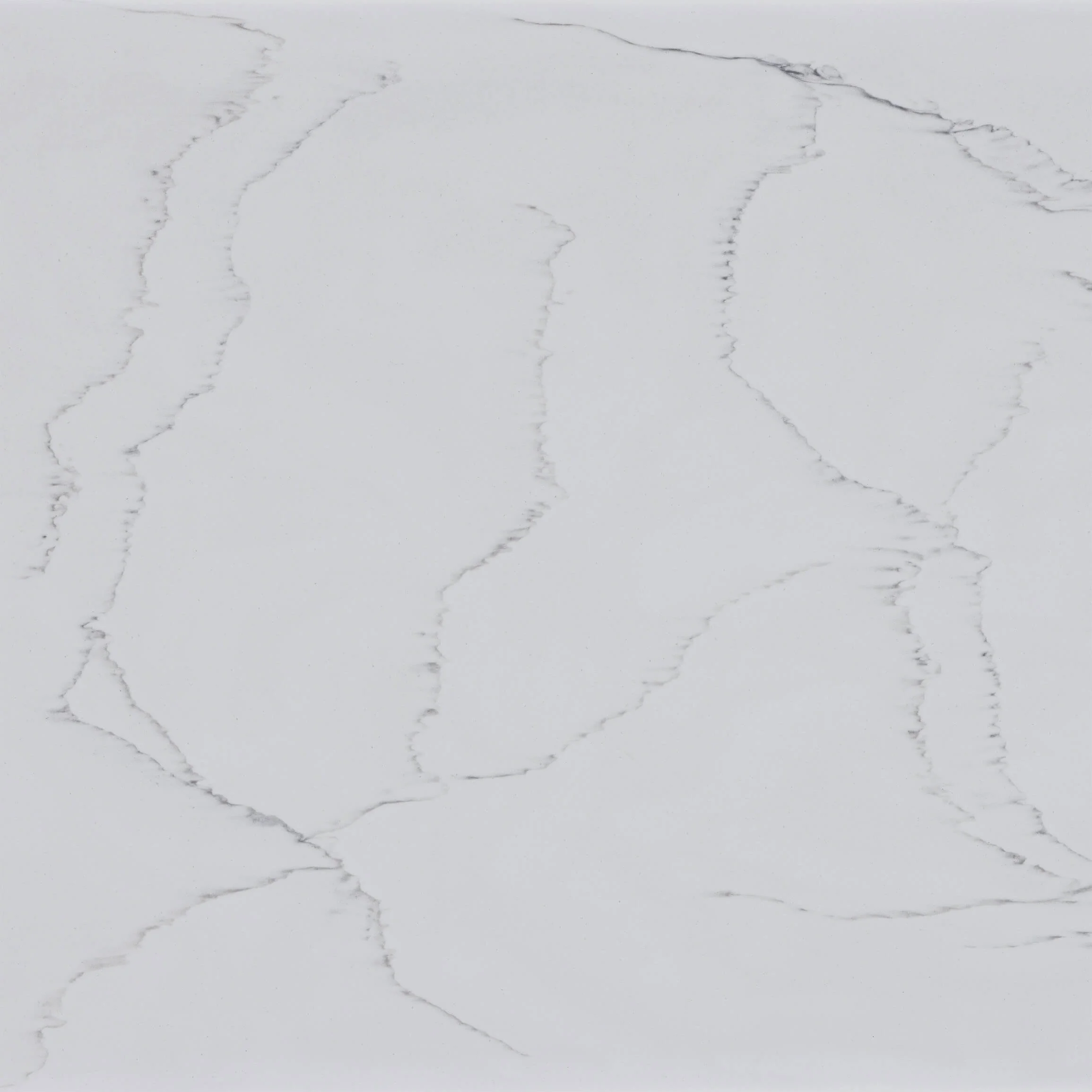 Close-up of white Staron Premier Legato Solid surface with gray veining.