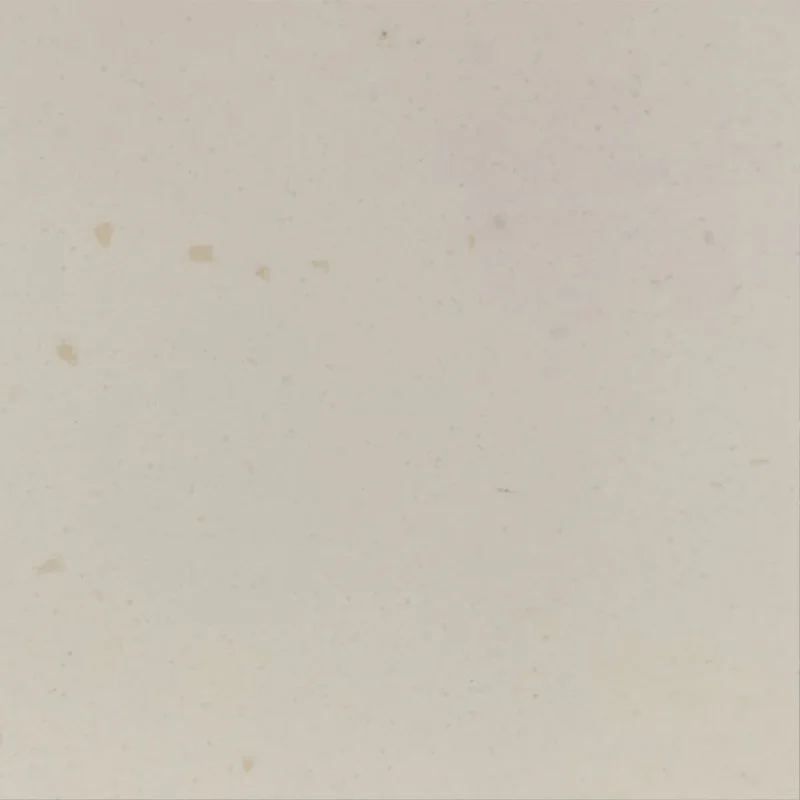 Close-up of beige Staron Pebble Straw surface.