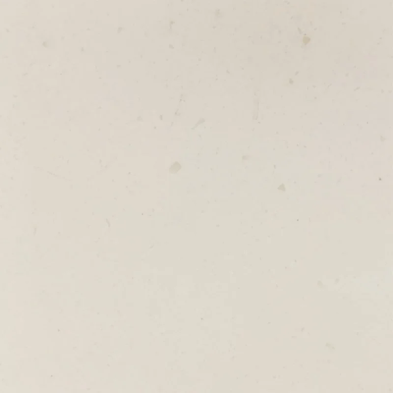 A blank off-white Staron Aspen Altai surface.
