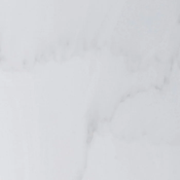 A dreamy white benchtop material with soft off-white light beige veining. Staron Supreme Cotton White