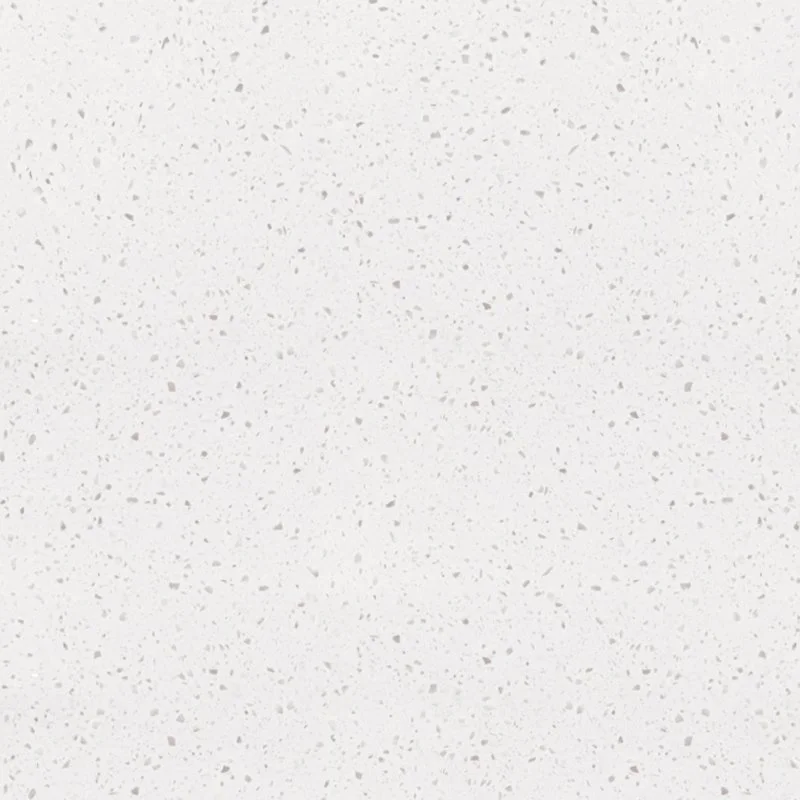 A close-up view of a white speckled Staron Aspen Alder surface.