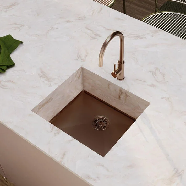 Close-up of a modern kitchen with Copper Corian AXIX 450 sink