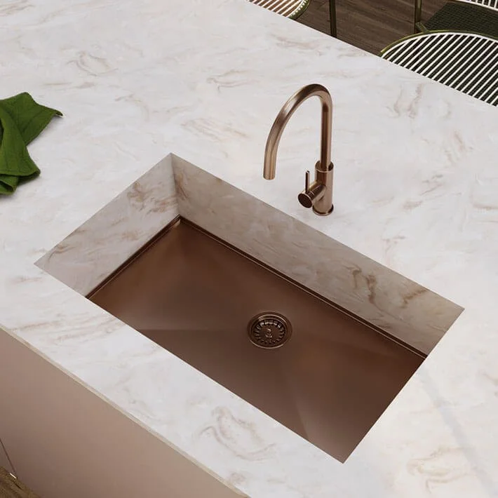 A modern kitchen sink with Copper Corian AXIX 700 sink
