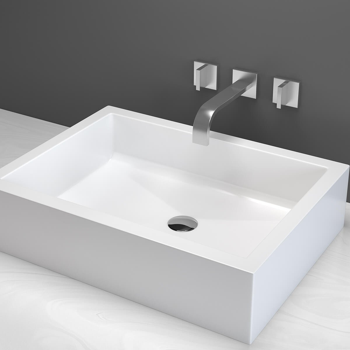 Modern white rectangular sink with a wall-mounted sleek silver faucet and two square wall mounts on a gray wall.