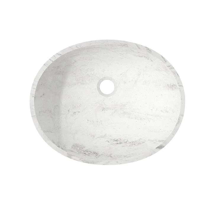 White oval Corian bathroom basin with a centered drain hole
